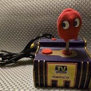 This listing is for a Namco Jakks Pacific Pac Man 5-1 TV Game Plug and Play 2003